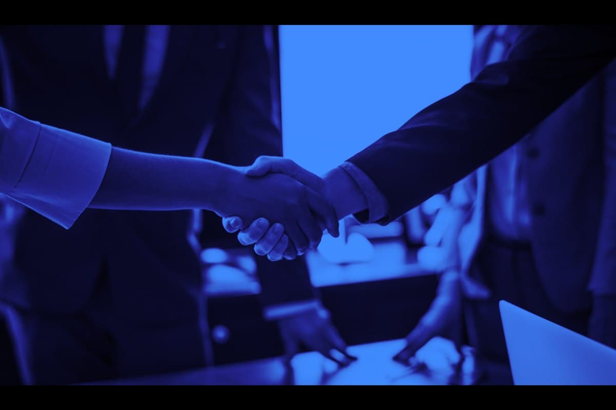 Nanua & Ioffe Lawyers — handshake with a citizenship-by-descent client